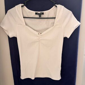 white shirt with pink coquette rosette